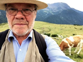 Portrait of smiling man with dog