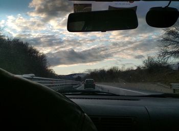 Road seen through car windshield