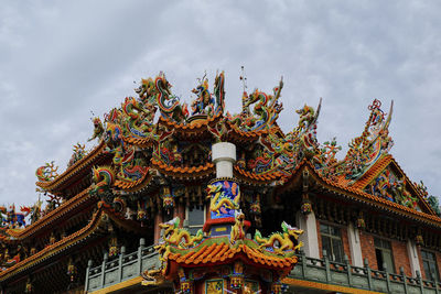 Low angle view of temple against sky