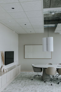 Interior of empty board room with blank whiteboard at corporate office