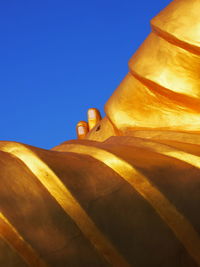 Low angle view of built structure against blue sky