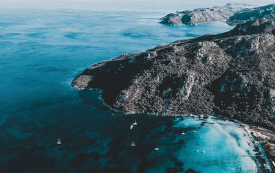 High angle view of rock formation in sea