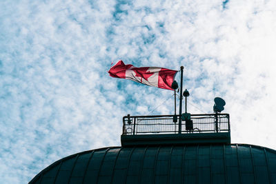 Low angle view of flag against sky