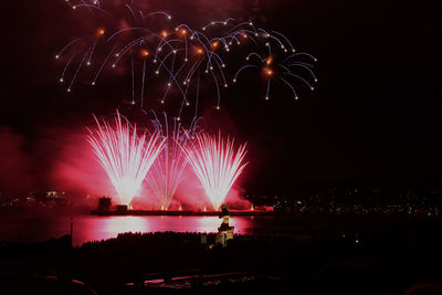 Firework display at night