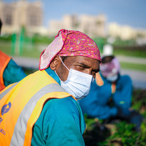 Close-up of man working on field