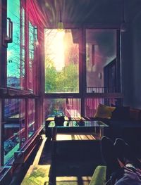 Chairs and table by window