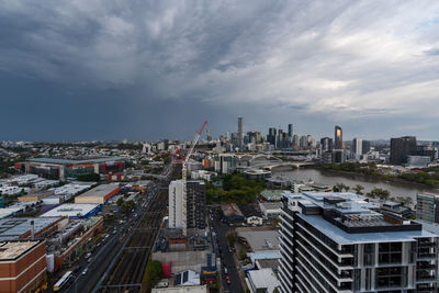 High angle view of buildings in city against sky