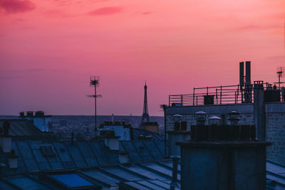 Buildings against sky during sunset