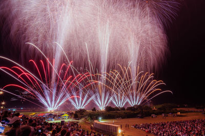 Firework display at night