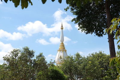 Low angle view of tower against cloudy sky