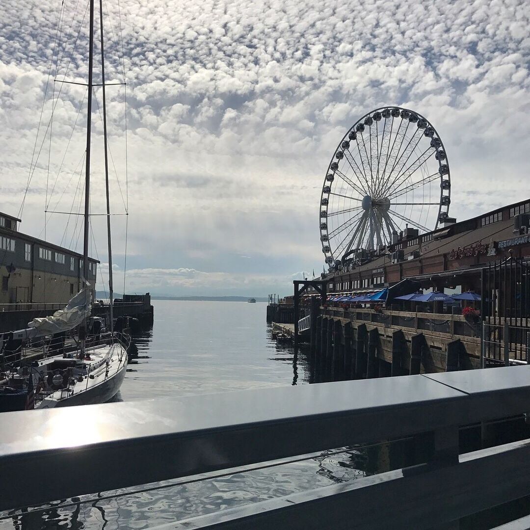 nautical vessel, sky, ferris wheel, sea, water, transportation, day, no people, cloud - sky, outdoors, built structure, nature, architecture