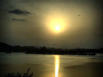 Scenic view of sea at sunset