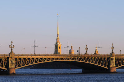 Bridge over river against clear sky