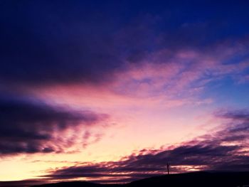 Low angle view of dramatic sky during sunset