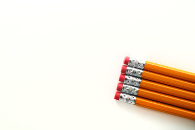 Close-up of pencils against white background