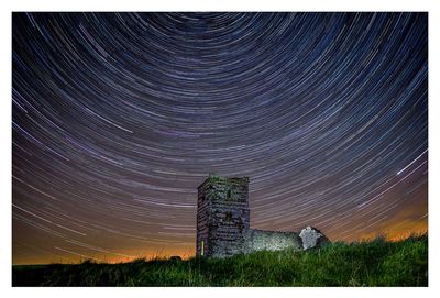 Scenic view of star field against sky at night