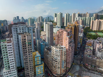 Buildings in city against sky