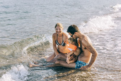 Friends enjoying at beach