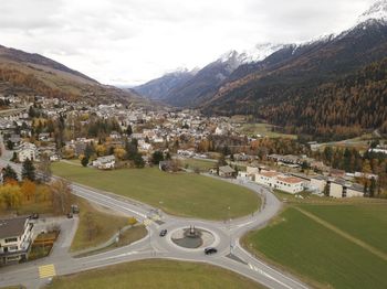 Aerial view of road amidst buildings in city