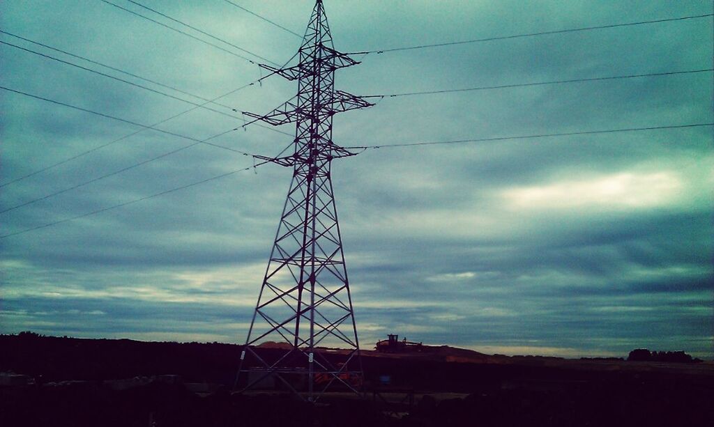 power line, electricity pylon, power supply, electricity, sky, cable, low angle view, connection, cloud - sky, fuel and power generation, technology, cloudy, silhouette, cloud, power cable, built structure, architecture, outdoors, no people, dusk