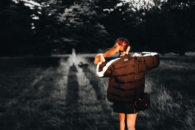 Woman standing on field