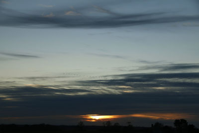 Scenic view of dramatic sky during sunset