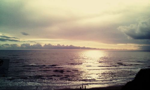 Scenic view of sea against cloudy sky