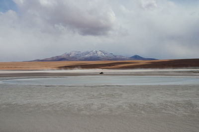 Scenic view of lake and landscape at atacama desert during winter