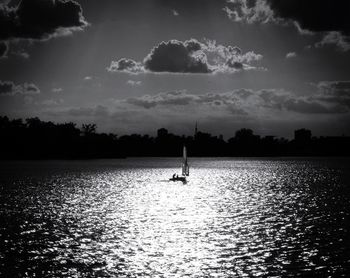 Scenic view of lake at sunset