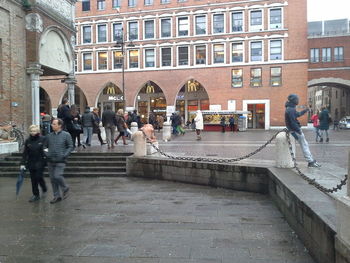 Group of people in front of building