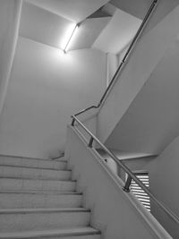 Low angle view of spiral staircase in building