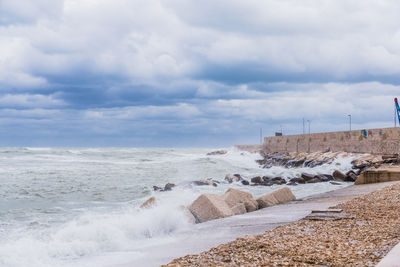 Scenic view of beach against sky