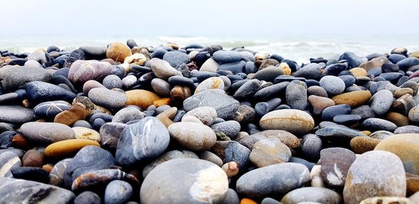 Close-up of stones on beach