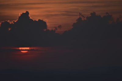 Scenic view of sea against orange sky