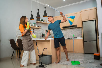 Rear view of man working at home