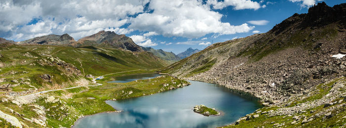 Panoramic view of river and mountains against sky