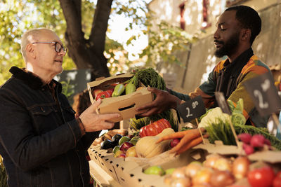 Midsection of man preparing food