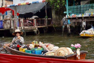 High angle view of people in boat at market