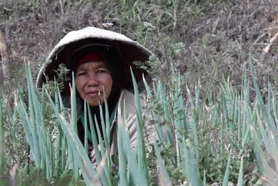 Close-up of man in grass