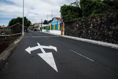 Road sign on street in city