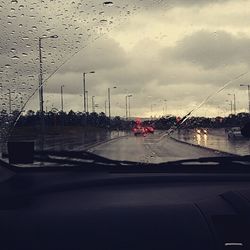 View of road against cloudy sky