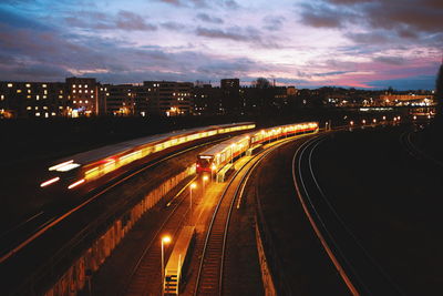 High angle view of light trails on road in city