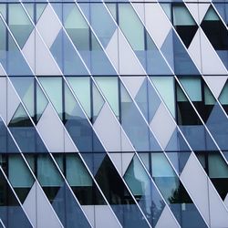 Full frame shot of glass building with windows