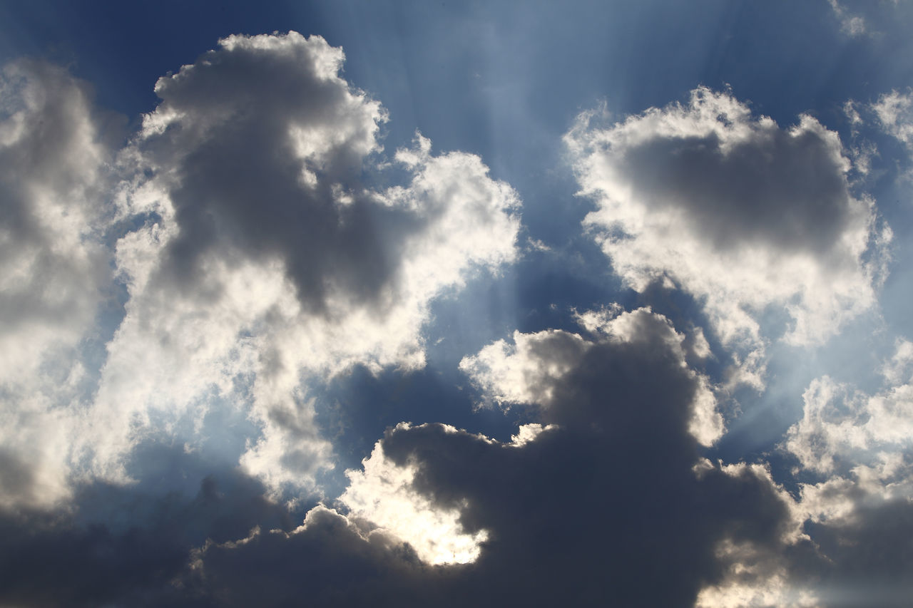 sky, cloud, daytime, cloudscape, nature, beauty in nature, environment, dramatic sky, backgrounds, sunlight, blue, atmosphere, no people, outdoors, wind, overcast, scenics - nature, idyllic, storm, storm cloud, sunbeam, light - natural phenomenon, religion, fluffy, spirituality, tranquility, summer, day, white, awe, bright, meteorology