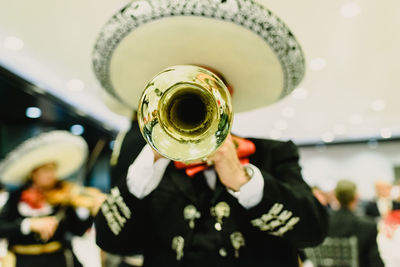 Man playing trumpet during event