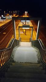 High angle view of illuminated staircase in building at night