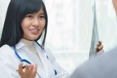 Portrait of a smiling young woman