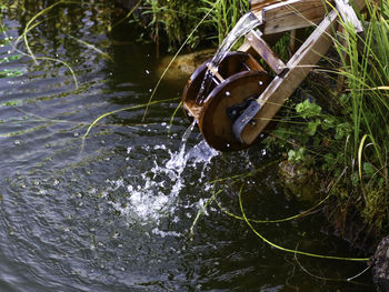 High angle view of water flowing in lake