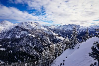 Scenic view of snowcapped mountains against sky