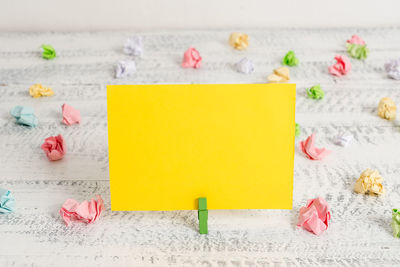 Close-up of yellow flowers on table